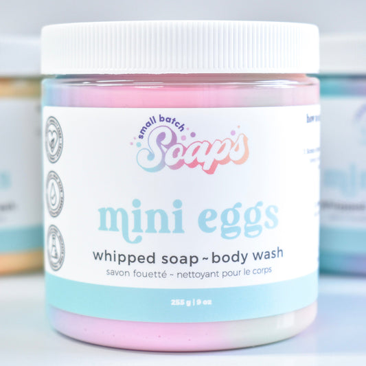 Jar of 'mini eggs' whipped soap-body wash with visible branding on a light background